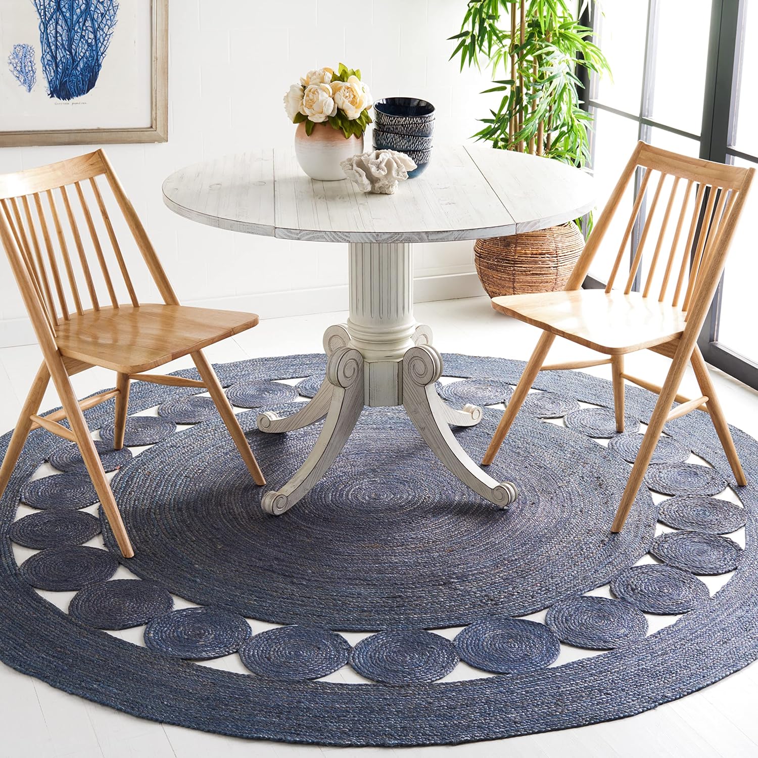 BlueRoundTikki.jpg Round woven rug with white dining table and chairs