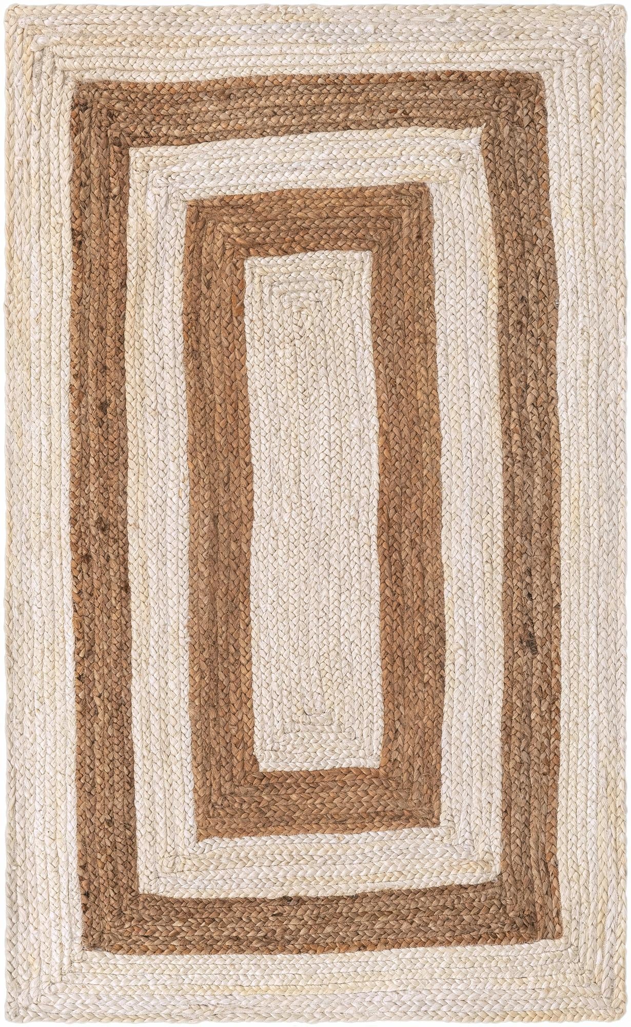 Modern White & Natural Jute Area Rug Natural and white geometric jute rug placed in modern living room decor