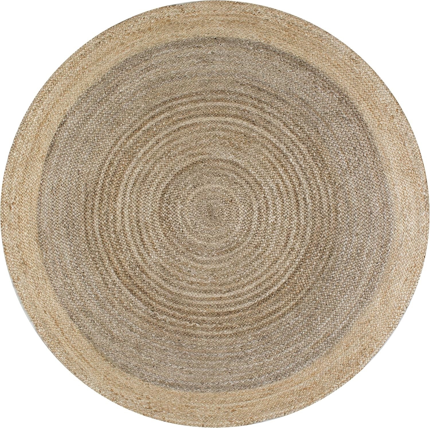 Round Jute Rug Braided round jute rug shows a swirl pattern and a light border against a white background.
